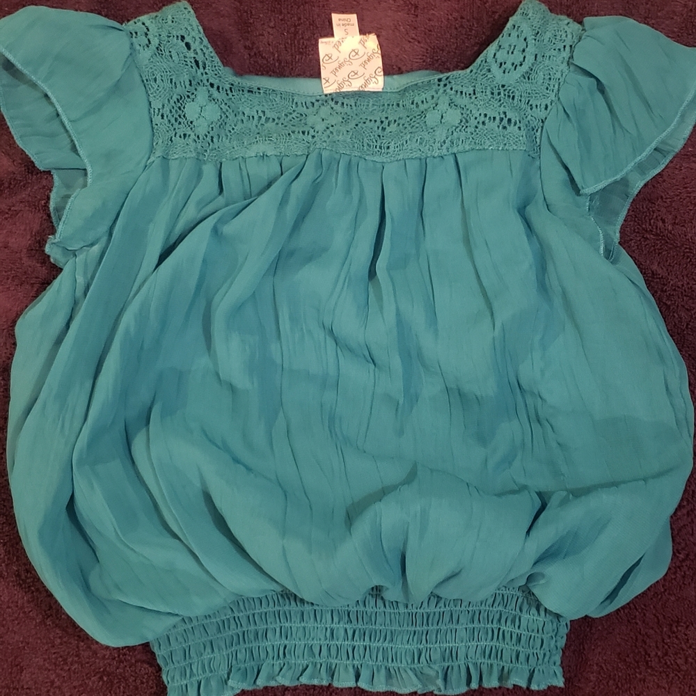 D Signed size S ruffle Sleeve Turquoise Top